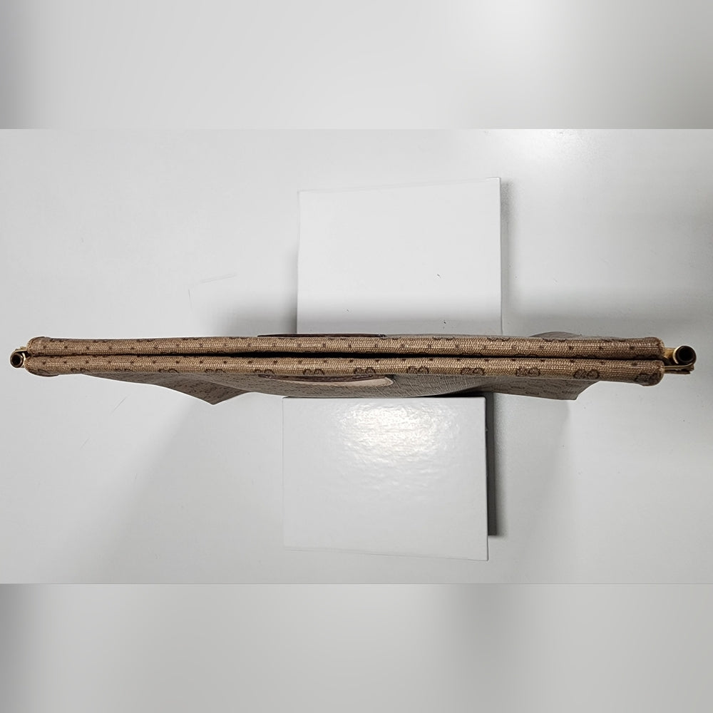 Gucci Micro GG vintage clutch.