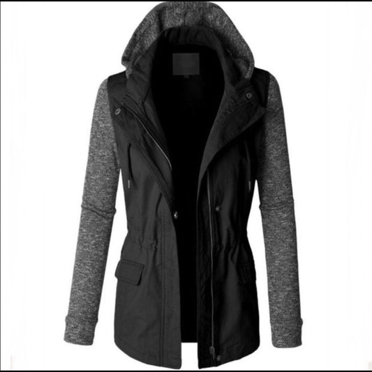 🆕 Black utility jacket with contrasting sleeves.