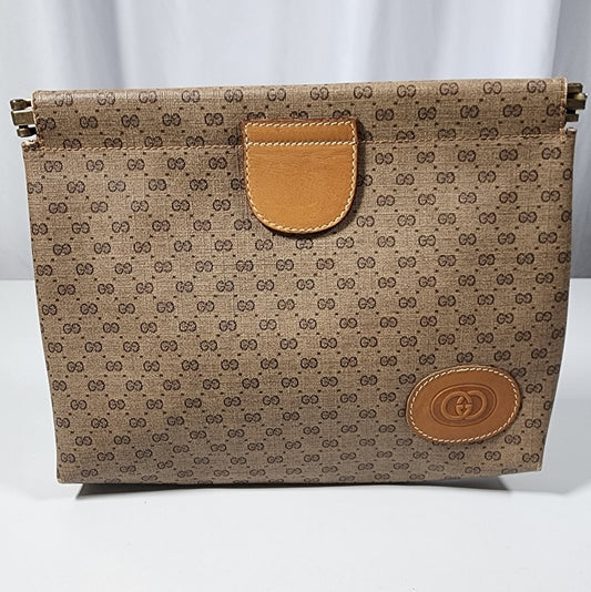 Gucci Micro GG vintage clutch.